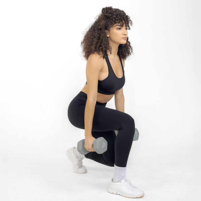 Athara CoreFlow Leggings in Black – Side View Action Shot
