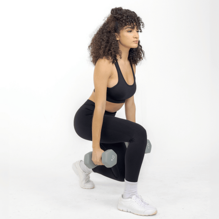 Athara CoreFlow Leggings in Black – Side View Action Shot