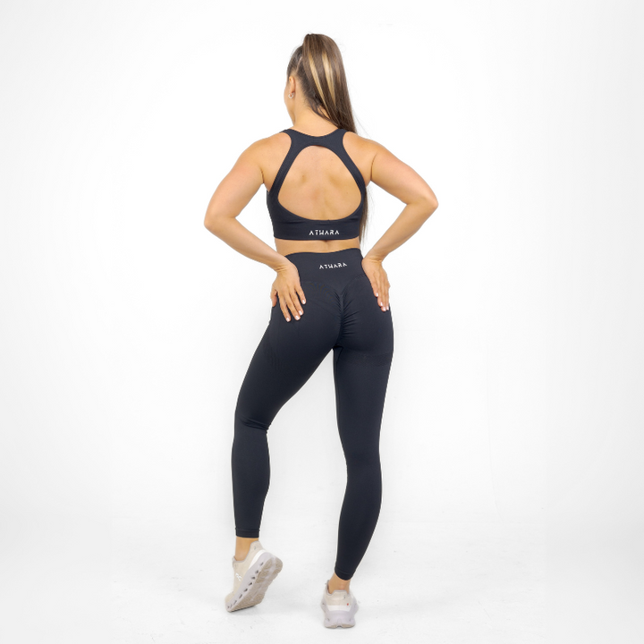 Athara MaxSculpt Leggings in Black – Full-Length Angle View on Model