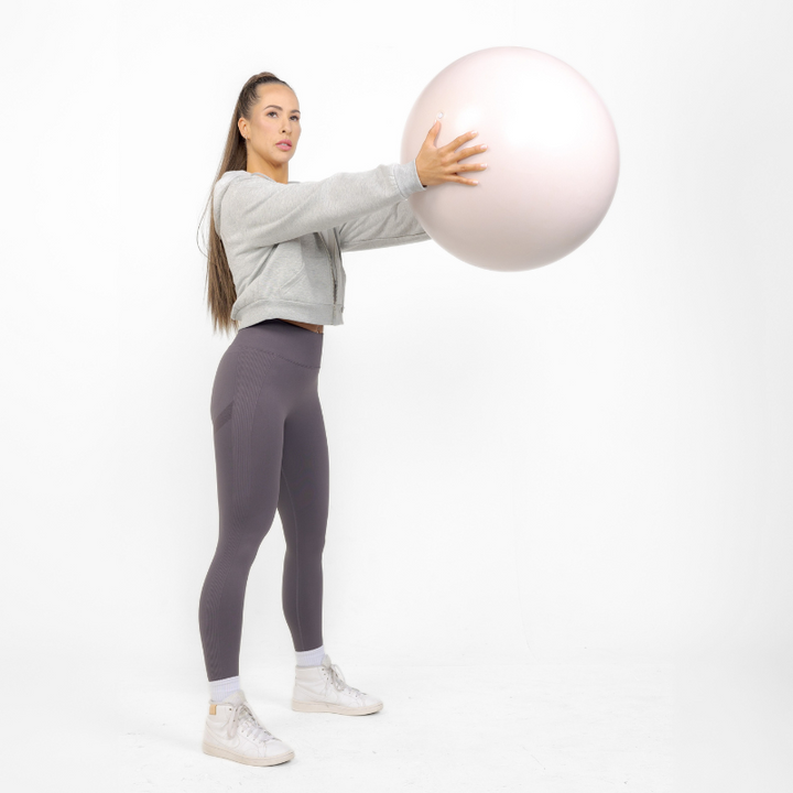 Athara MaxSculpt Leggings in Dark Gray – Side View Action Shot