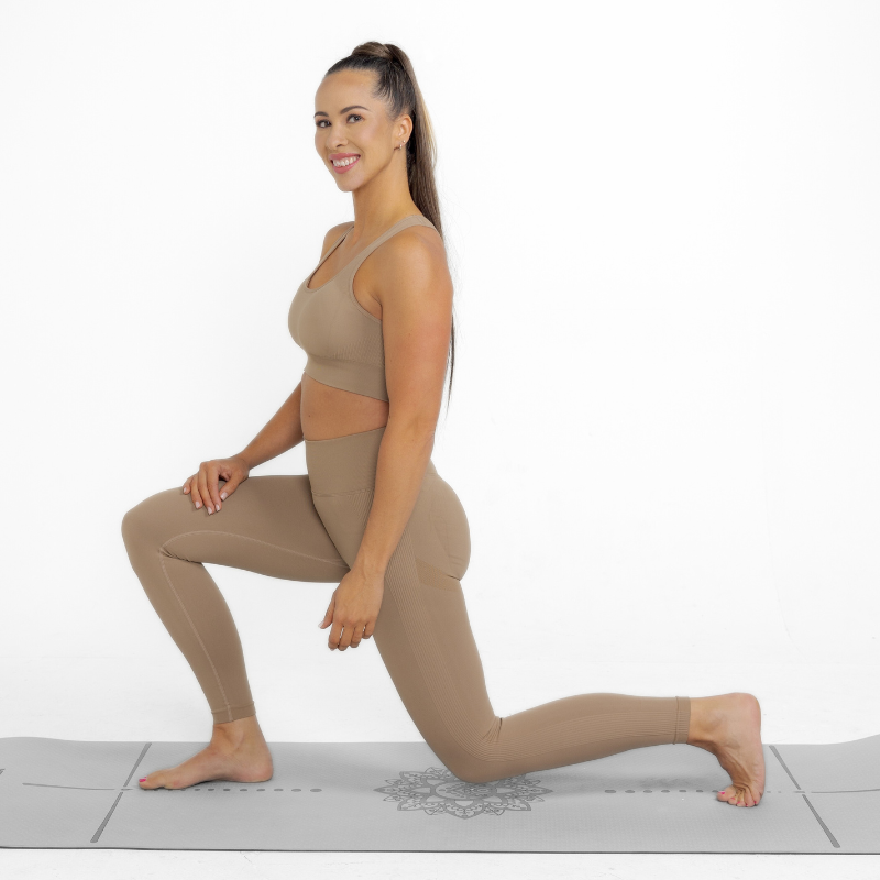 Athara MaxSculpt Leggings in Desert Tan – Side View Action Shot