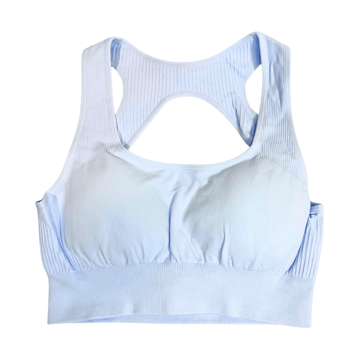 Athara MaxSculpt OpenBack Sports Bra in Glacier Blue – Flat Lay